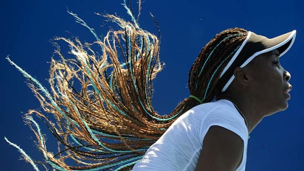 Seven-time grand slam winner Venus Williams practises at Melbourne Park ahead of Monday's Australian Open.