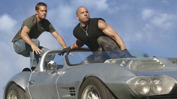 You go first: Paul Walker and Vin Diesel return for another stunt-packed joyride in Fast and Furious Five.