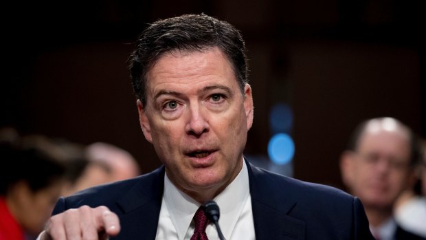 Former FBI director James Comey speaks during a Senate Intelligence Committee.