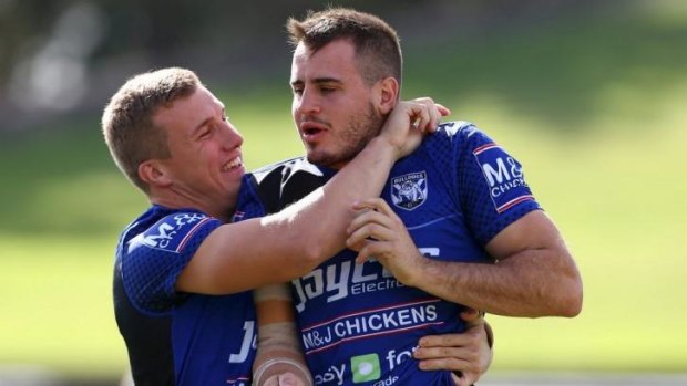 Blues brothers in arms: halves duo Trent Hodkinson and Josh Reynolds.