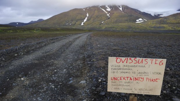 TURN BACK NOW: A warning sign blocks the road to Bardarbunga volcano, some 20 kilometres away, in the north-west region of the Vatnajokull glacier in Iceland.
