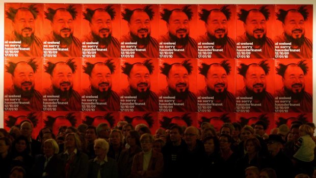 Visitors listen to Ai Weiwei, one of China's most controversial  artists, during the  'So Sorry' exhibition  in Munich in 2009.