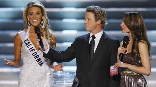 Against gay marriage ... hosts Billy Bush and Nadine Velazquez listen to Carrie Prejean's controversial answer during the pageant.