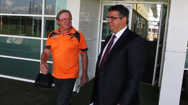 Giant steps: Kevin Sheedy and Andrew Demetriou on Monday.