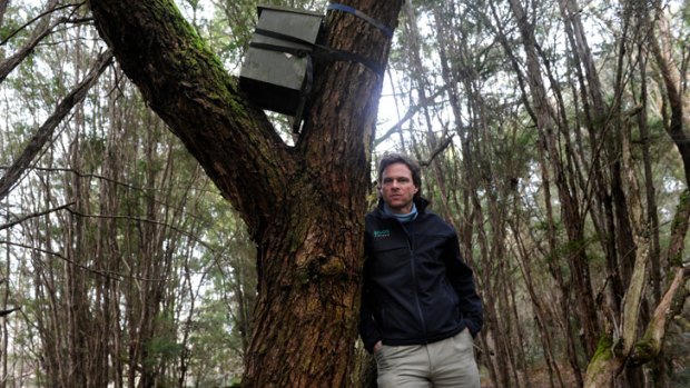 Biologist Dan Harley with a possum nest box at Yellingbo.