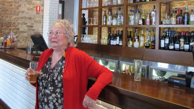 Merle Thorton at the bar named in her honour at the Regatta Hotel.