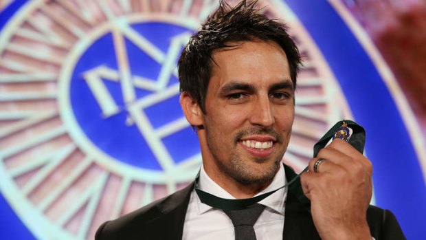 Just reward: Mitchell Johnson holds his Allan Border Medal, the icing on what has been an incredible return to form.