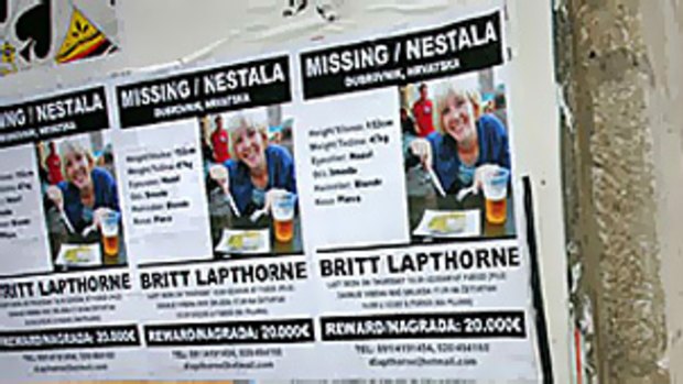 Posters offering a 20,000 euro ($A35,600) reward for  information leading to the discovery of Melbourne backpacker Britt Lapthorne plaster a building  in Dubrovnik, Croatia, where she went missing on September 17.