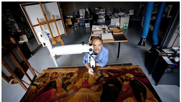 Conservator John Payne with one of his "children" at the NGV.