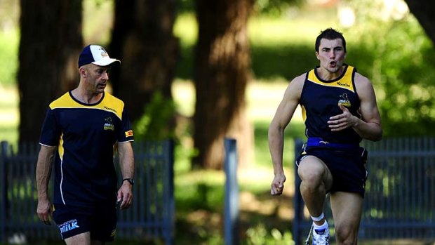 Close watch: Jaryd Cachia trains in Canberra with his uncle and ACT Brumbies athletic performance director Dean Benton ahead of the draft next week.