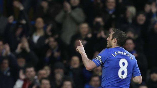 Heads you win ... substitute Marko Marin stoops to power home a rebound with his first touch to seal a nervy 4-1 home win for Chelsea against Wigan Athletic on Saturday.