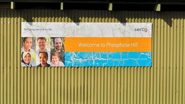 A welcome sign by management company Serco adorns the side of a building at Phosphate Hill Detention Centre on Christmas Island.