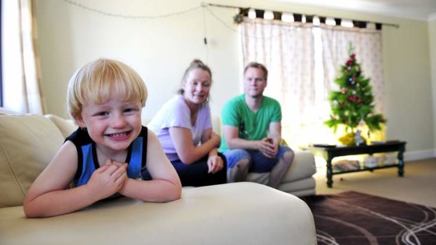 The Smith family, Matthew, Courtenay (corr)and son Leo, 3, happy to be in their new in home before Christmas after it took three years to build.