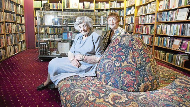Muriel Craddock, 97, with daughter Kay in their family book store beneath Assembly Hall, in Collins Street.