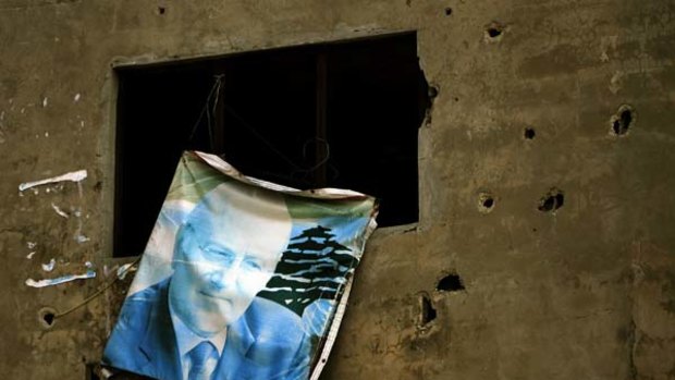 Writing's on the wall ... a poster of Najib Mikati in the Sunni bastion city of Tripoli, north of Beirut. Mr Mikati is set to take power.
