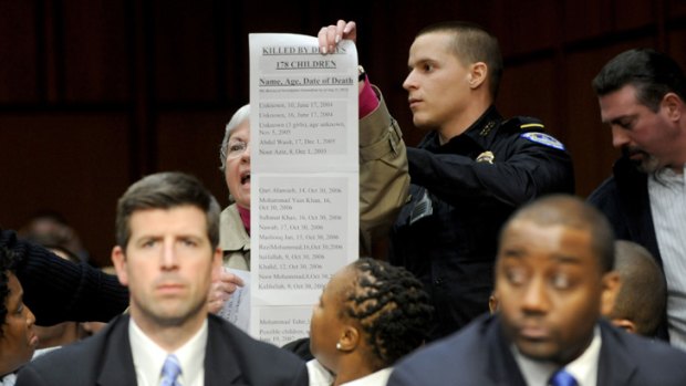 A demonstrator disrupts the confirmation hearing of John Brennan, US President Barack Obama's nominee to be director of the Central Intelligence Agency.