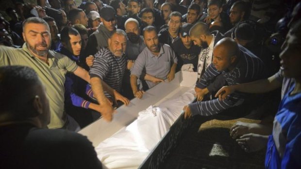 Demonstration of grief: A funeral is held for Adbel-Rahman Shaloudi, a Palestinian from east Jerusalem who drove his car into a train station, killing a woman and an infant, in Jerusalem.