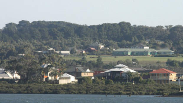 A report by the standing committee on climate change has found towns such as Hastings will be increasingly vulnerable to rising sea levels.