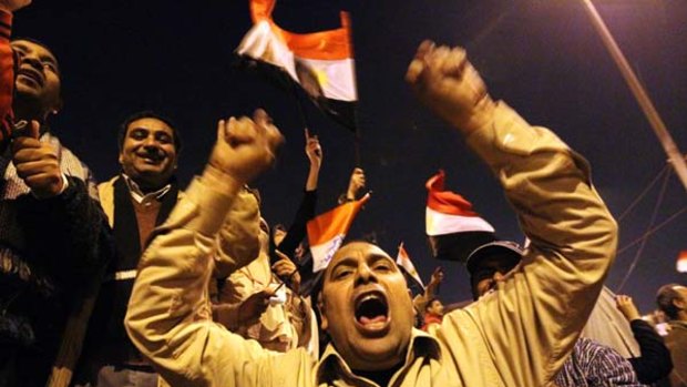 Emotional scenes ... protesters rejoice at news of Hosni Mubarak's resignation.