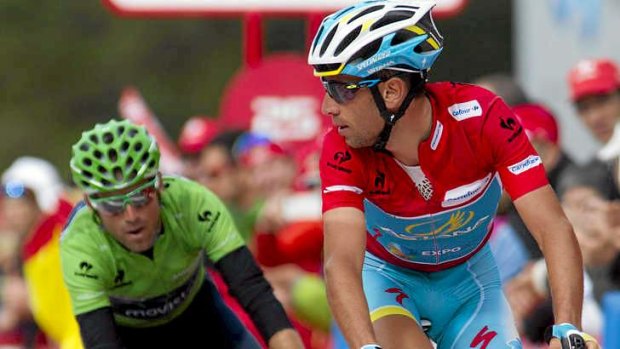 Race leader Vincenzo Nibali surrendered some of his lead in stage 15.