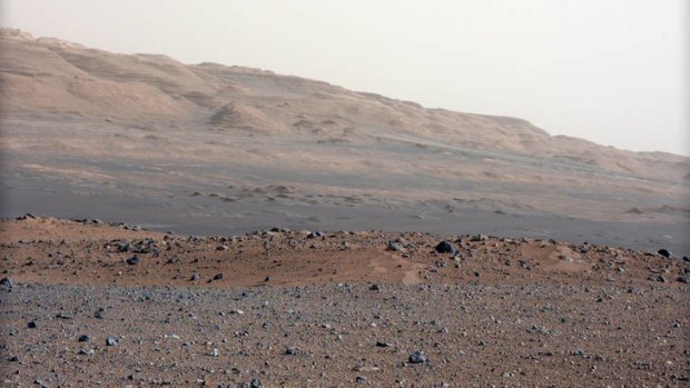 Portrait of Mars ... this image released by NASA on Monday, taken by the Mast Camera, highlights the geology of Mount Sharp, a mountain inside Gale Crater, where the Curiosity rover landed.