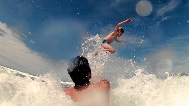Holiday fun: Swimmers enjoy the warm water at Maroubra on Monday.