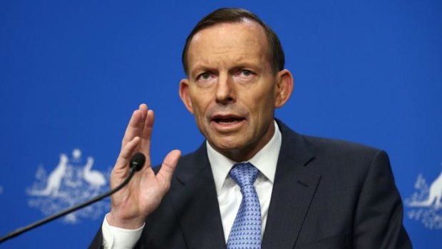 Prime Minister Tony Abbott addresses the media on Malaysia Airlines flight MH17 during a press conference.