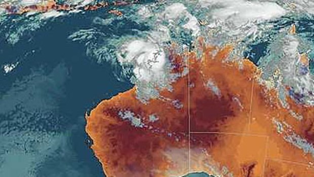 The latest satellite photo shows Cyclone Magda about to cross the coast.