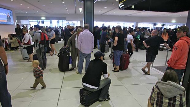 Passengers waiting at Tullamarine airport after the system meltdown.