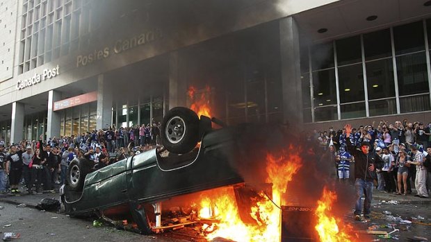 Not a good look ... Rioting in downtown Vancouver after an ice hockey game in June.