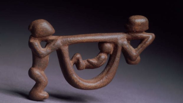 A FIGURE FROM THE AFRICAN ART SERIES