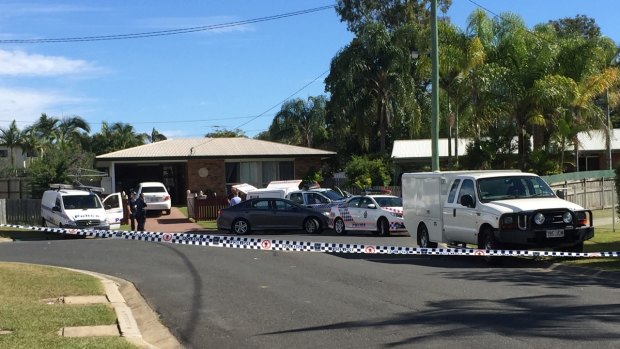 Police are scouring the Caboolture home where a 19-month-old boy was found dead.