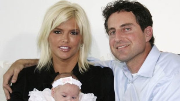 Tabloid fixture ... Anna Nicole Smith with her baby Dannielynn Hope and Howard Stern in the Bahamas in 2006.
