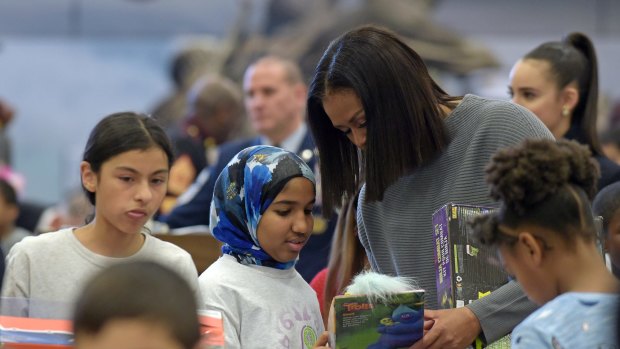 First lady Michelle Obama helps sort toys and gifts for the Marine Corps' Toys for Tots Campaign at Joint Base Anacostia-Bolling in Washington.