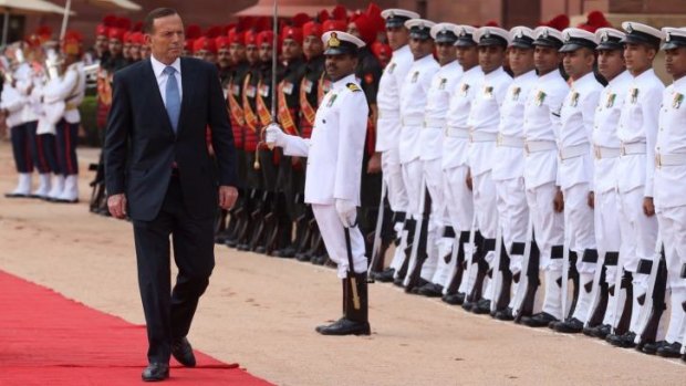 A ceremonial welcome for Tony Abbott.
