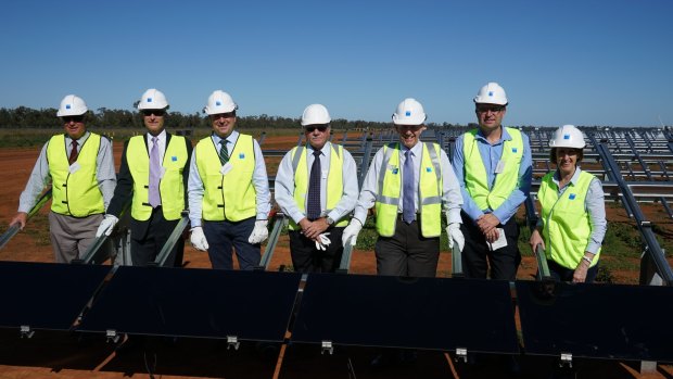 AGL's first installers: (L-R) Ray Donald, Bogan Shire Mayor; Ivor Frischknecht, ARENA, CEO; Kevin Humphries, Minister for Western NSW; Brian Stanley, First Solar Senior Vice President; Mark Coulton, Federal MP for Parkes; Scott Thomas, AGL executive; Leslie Williams MP, NSW Parliamentary Secretary for Renewable Energy.