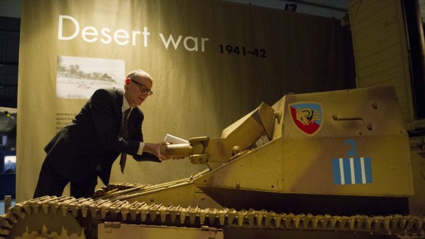 News
Senior Curator Shane Casey  with the Carro Veloce L.3/33 Tankette arrives at the Australian War Memorial on loan from the Canadian War Museum.
The Canberra Times
Date: 25 August 2015
Photo Jay Cronan