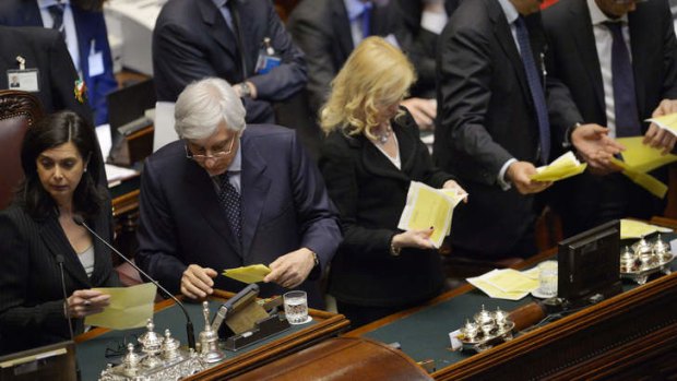 The Italian Parliament President Laura Boldrini, left, begins the vote count.