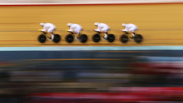 On target: The Australian men's pursuit team before mishap ended their chances in London. 