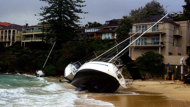 Boats washed up at  Little Manly beach.