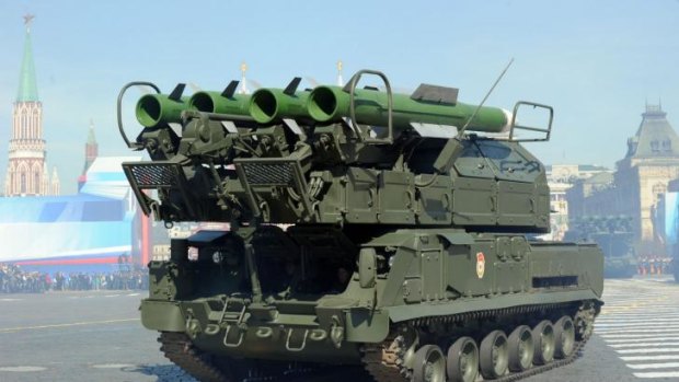 This file picture taken on May 9, 2013 shows a Russia's air defence system Buk-2M arnoured launcher vehicles at the Red Square in Moscow during Victory Day parade. A Russian-made surface-to-air missile has emerged as the most likely cause of the suspected downing of a Malaysian airliner over Ukraine, analysts said
