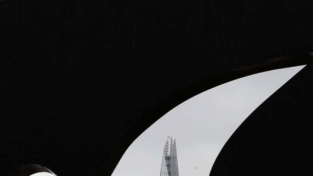 The Shard seen through an outdoor art installation in London.