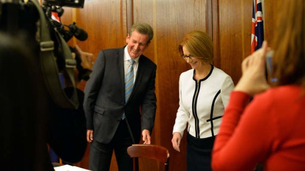 New South Wales Premier Barry O'Farrell and Prime Minister Julia Gillard prepare to sign the National Education Reform Agreement in Sydney on Tuesday.