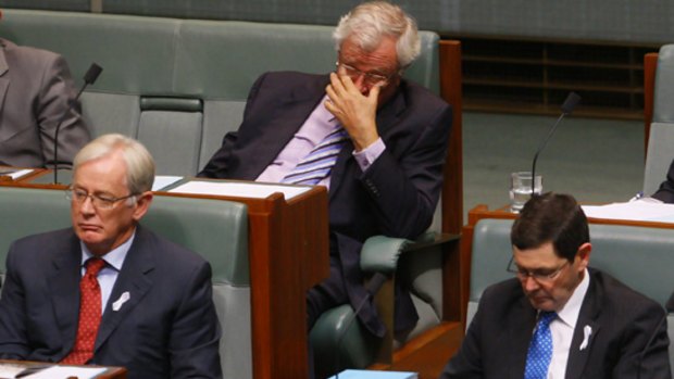 Dissenting backbenchers Wilson Tuckey centre top, failed leadership aspirant Kevin Andrews right and Andrew Robb left, in Parliament.