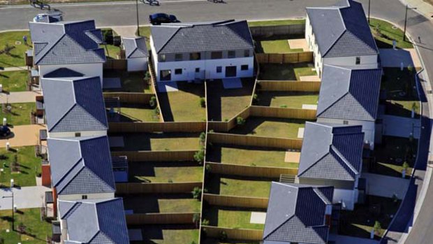 "This [Boomburbs] exhibition gives a fascinating bird's-eye view ... while putting Sydney's housing issue under the spotlight" ...  houses in Woodcroft.
