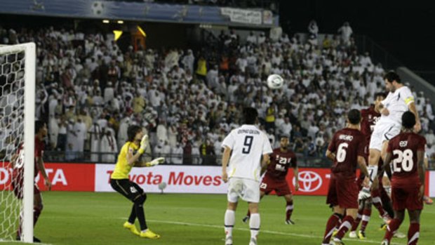 Captain's nod ... Sasa Ogenovski scores against Al Wahda in Abu Dhabi.