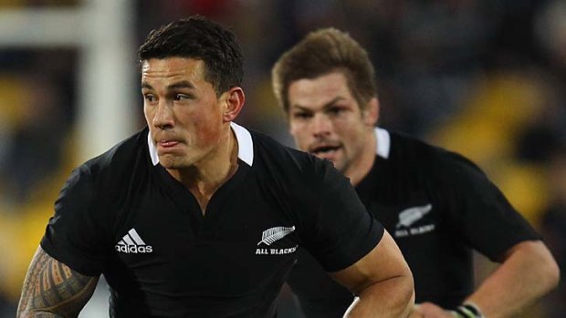 Wearing all black ...  Sonny Bill Williams makes a run with skipper Richie McCaw against South Africa on Saturday.