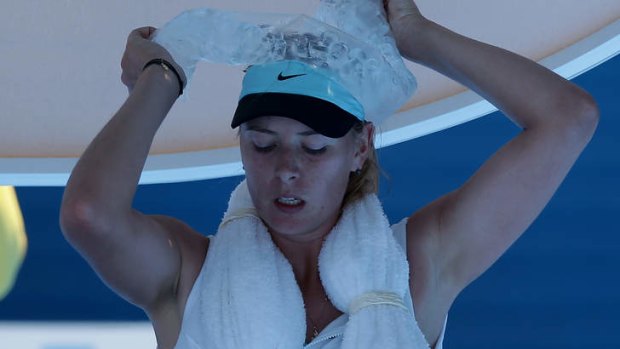 Maria Sharapova tries to cool down with an ice pack during her epic 3 and a half hour battle.