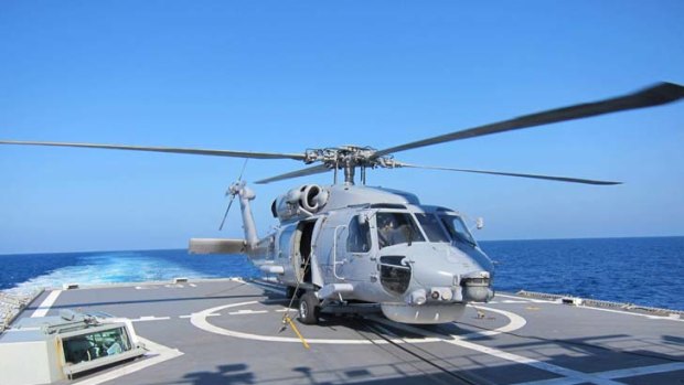 A Sea Hawk helicopter on the deck of the HMAS Stuart.