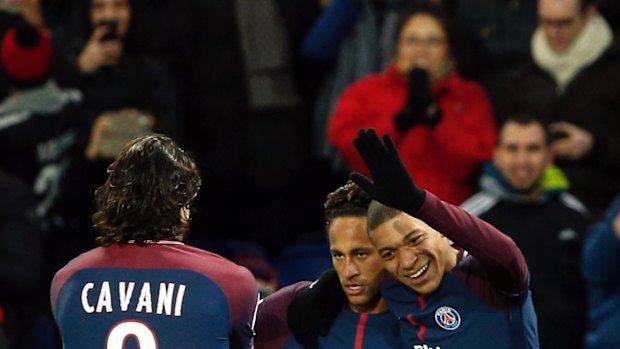 All smiles: Neymar with Edinson Cavani and Kylian Mbappe.